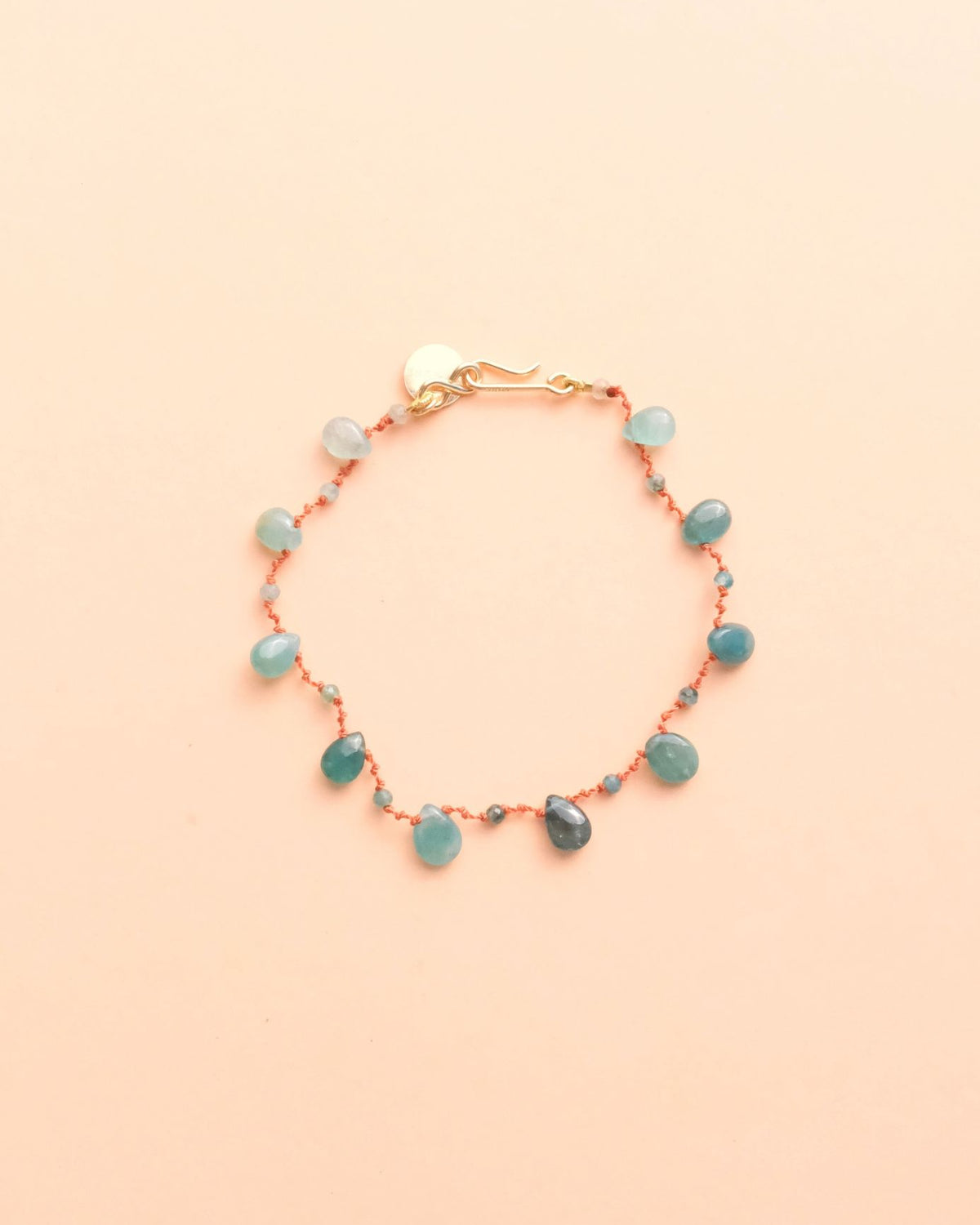 Bracelet Osprey DB en grandidiérite, gouttes lisses sur cordon — IVARENE Paris