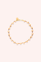 Bracelet de cheville 'Bird Pêche' avec perles pêche – bijou délicat