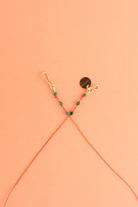 5-Drop Necklace in malachite, close-up — IVARENE Paris