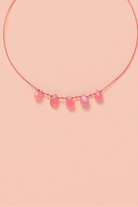 Collier en rhodocrosite sur cordon — IVARENE Paris