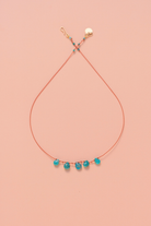 Collier en turquoise sur cordon — IVARENE Paris