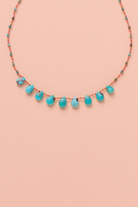 Collier en turquoise sur cordon — IVARENE Paris
