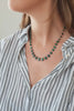 Collier Savannah en malachite, vidéo du collier porté au cou — IVARENE Paris
